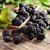Frische Brombeeren mit grünen Blättern zum ASMO KÜCHEN Ratgeber über Brombeeren